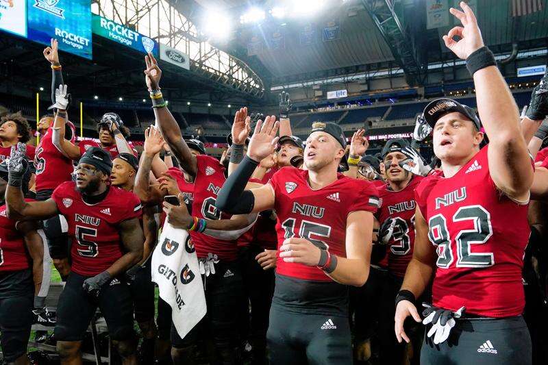 NIU Huskies celebrating the 2021 MAC Championship